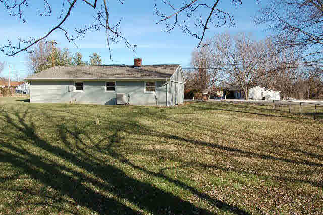 889 Augusta Farms Road Stuarts Draft, VA 24477 - Photo 3 of 10 a view of a house with a yard