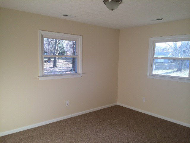 889 Augusta Farms Road Stuarts Draft, VA 24477 - Photo 5 of 10 an empty room with windows