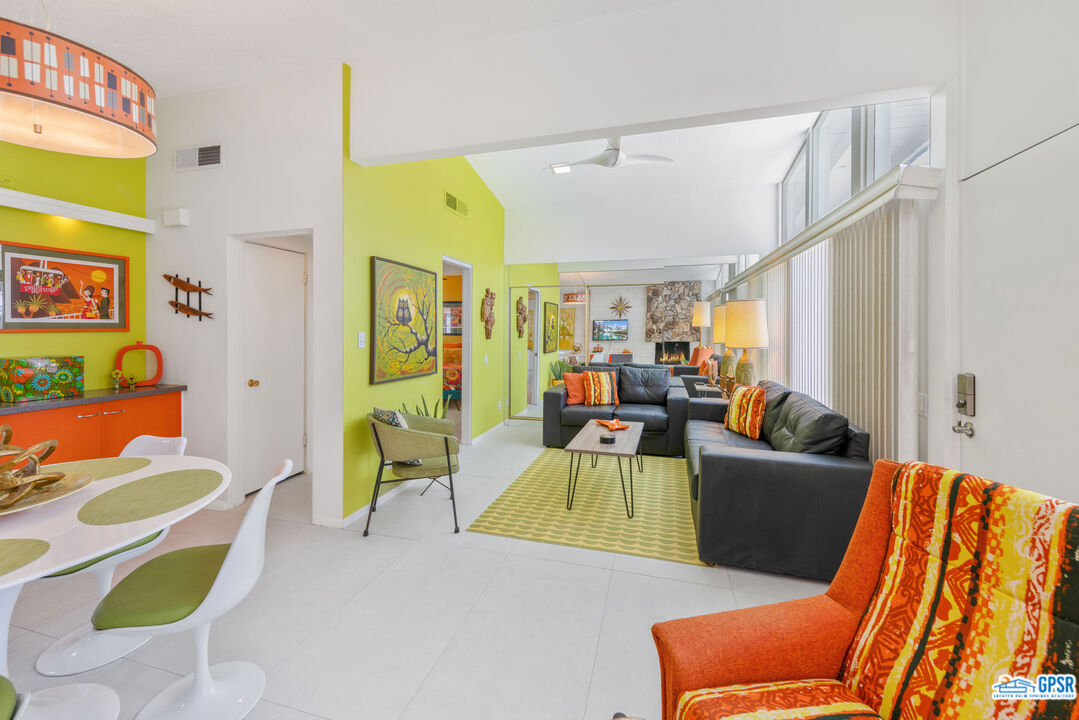 1655 Andee Drive Palm Springs, CA 92264 - Photo 8 of 23 a living room filled with furniture and a rug
