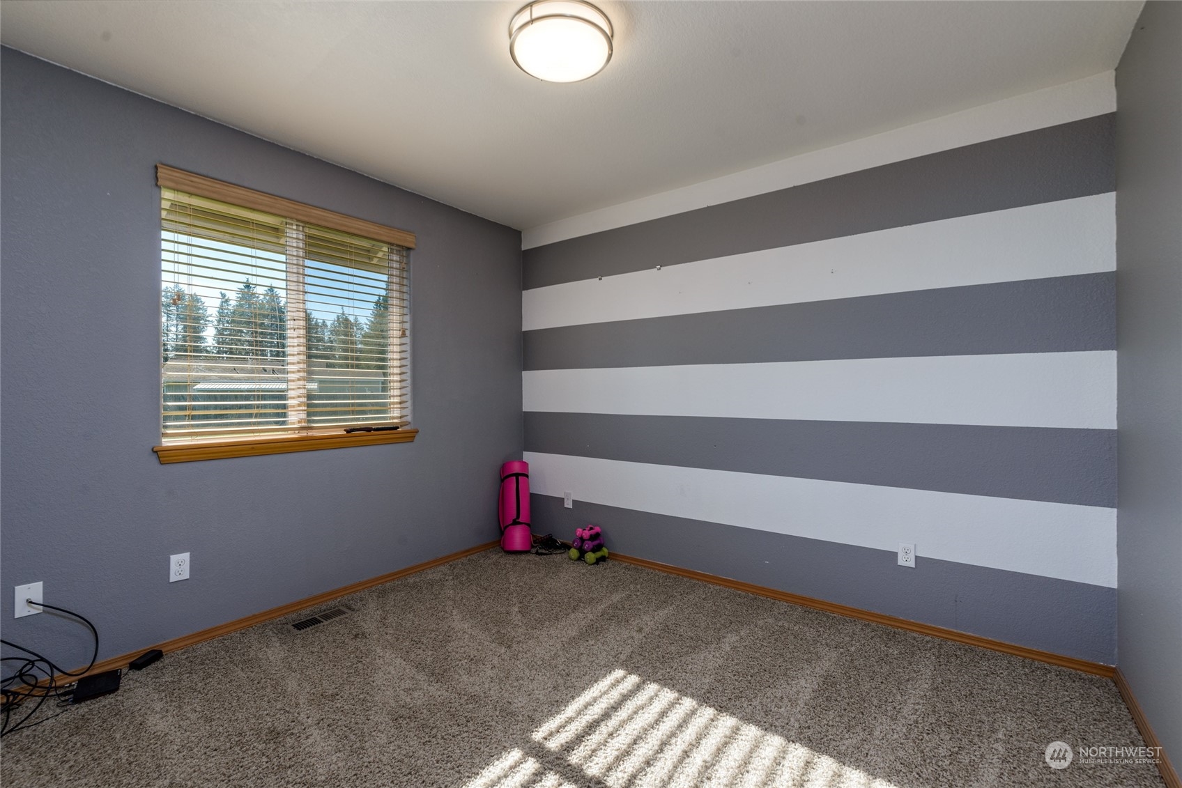 17914 Michelles Lane Southwest Rochester, WA 98579 - Photo 13 of 28 a view of empty room with air conditioner and window