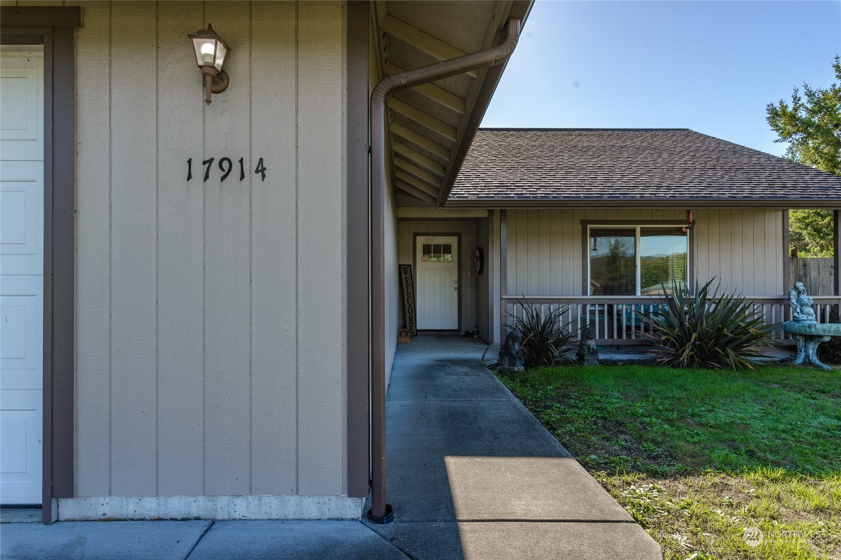 17914 Michelles Lane Southwest Rochester, WA 98579 - Photo 2 of 28 a view of a porch with a yard