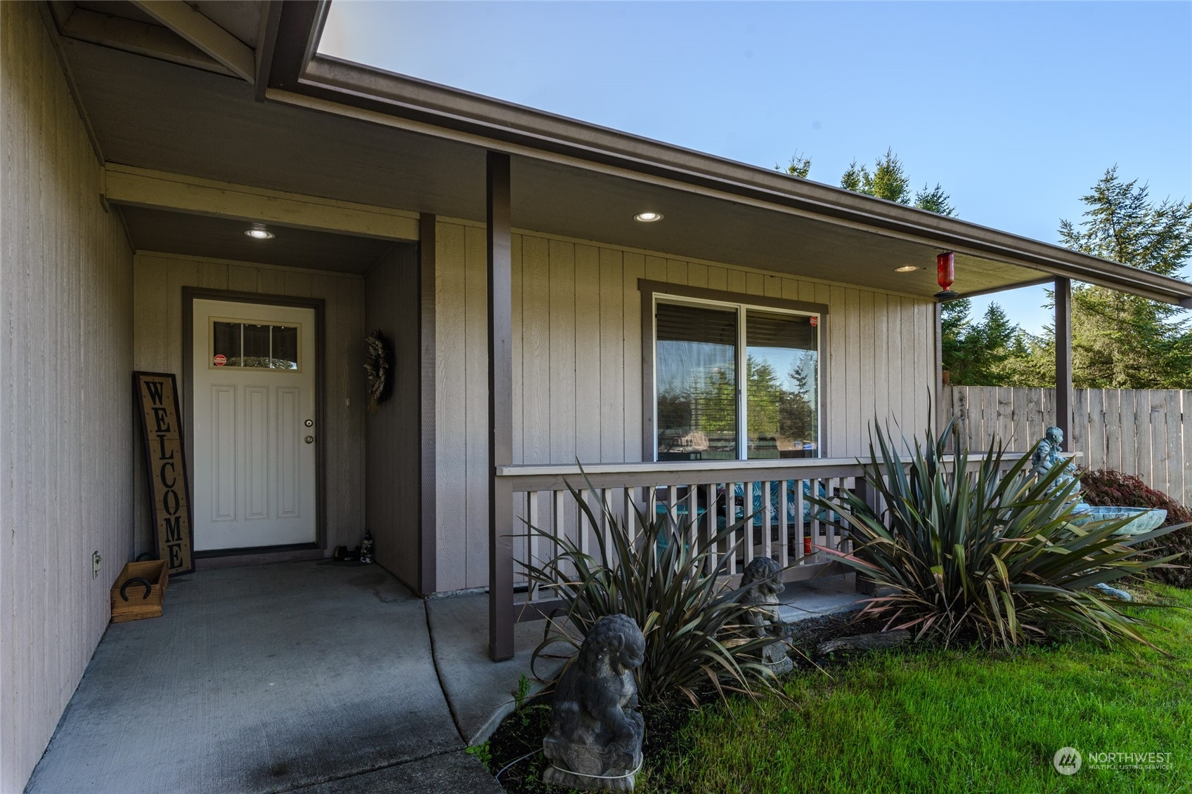 17914 Michelles Lane Southwest Rochester, WA 98579 - Photo 3 of 28 a view of a backyard with a patio