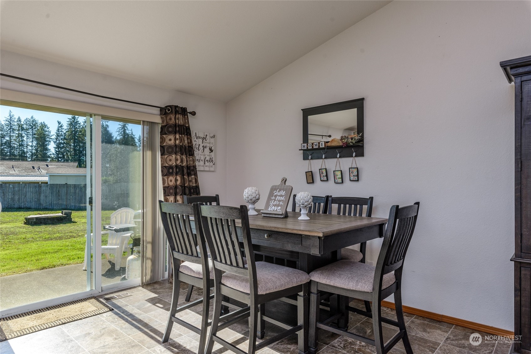 17914 Michelles Lane Southwest Rochester, WA 98579 - Photo 8 of 28 a view of a dining room with furniture window and outside view