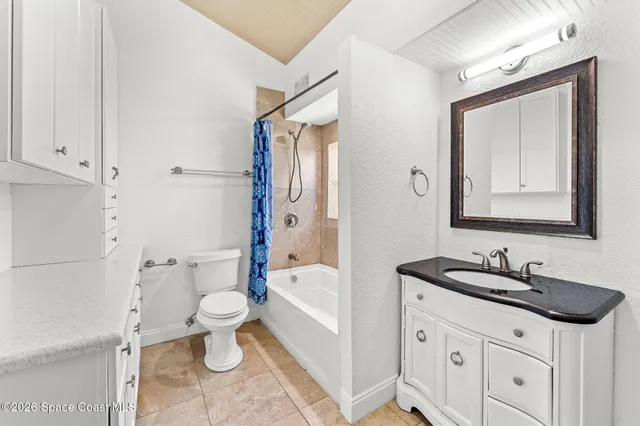 a kitchen with a stove and a microwave