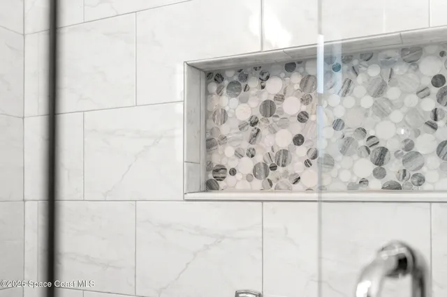 an aerial view of houses with outdoor space