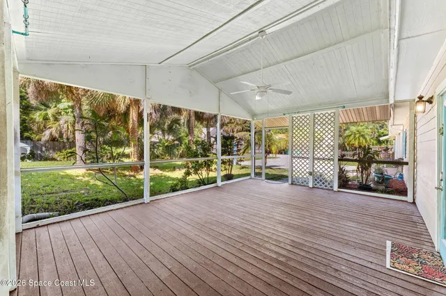 a kitchen with a sink cabinets and window