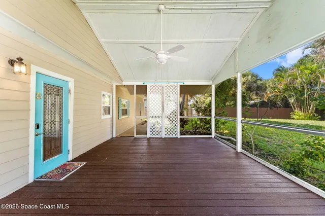 a kitchen with stainless steel appliances chandelier a refrigerator and a stove