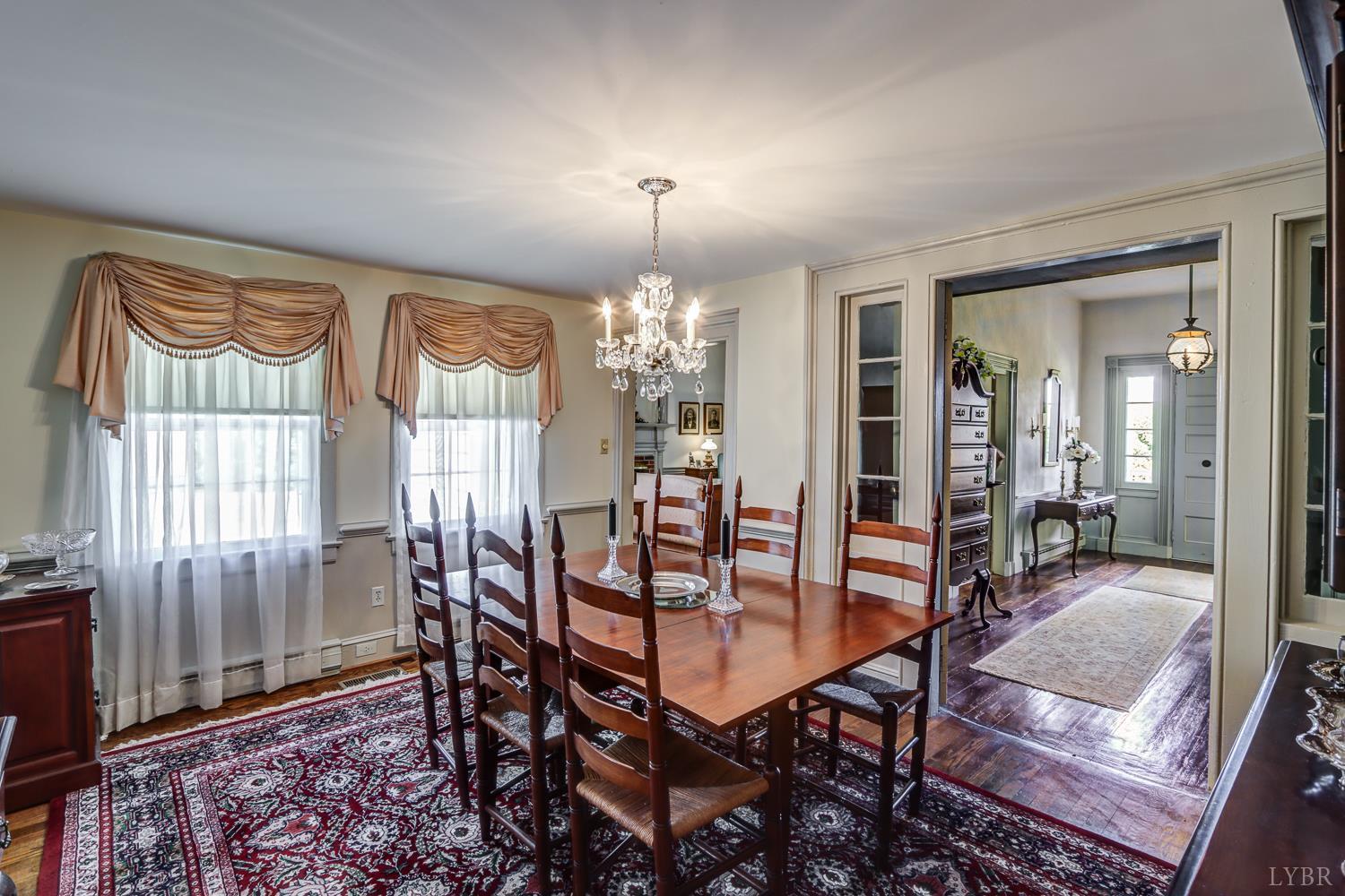 129 Lawyers Road Red House, VA 23963 - Photo 23 of 72 a view of a dining room with furniture window and wooden floor