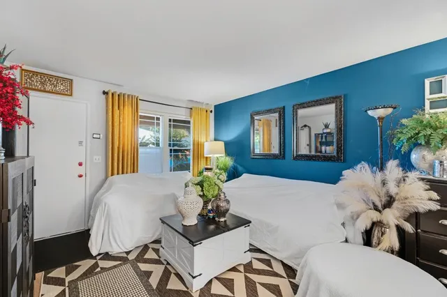 a kitchen that has a lot of cabinets in it