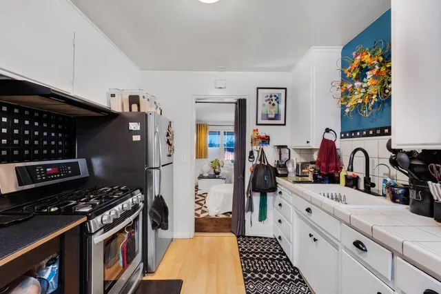 a very nice looking dining room with a table and chairs