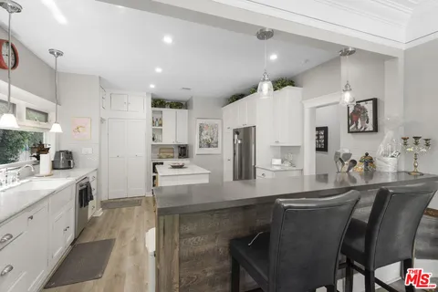$8,450 | 937 South Tremaine Avenue, Los Angeles, CA 90019