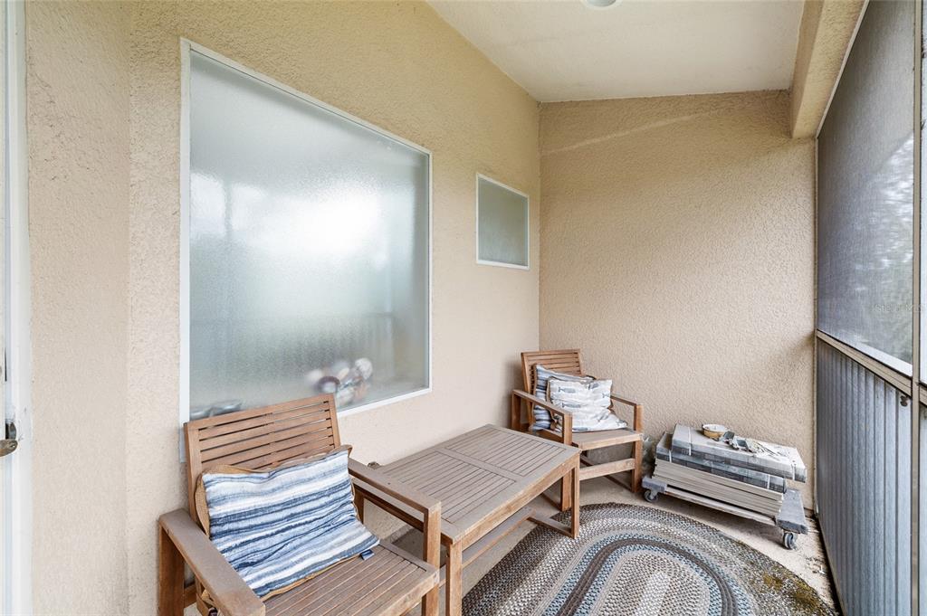 7467 Terrace River Drive Temple Terrace, FL 33637 - Photo 37 of 46 a bedroom with a bed and wooden floor