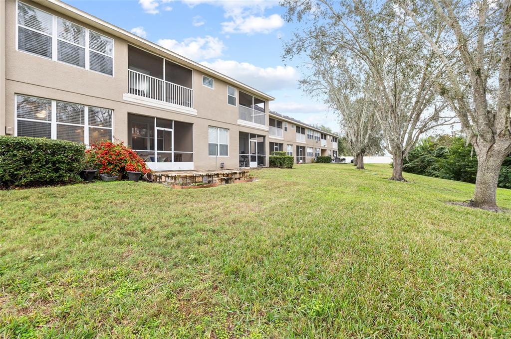 7467 Terrace River Drive Temple Terrace, FL 33637 - Photo 41 of 46 a front view of a building with garden
