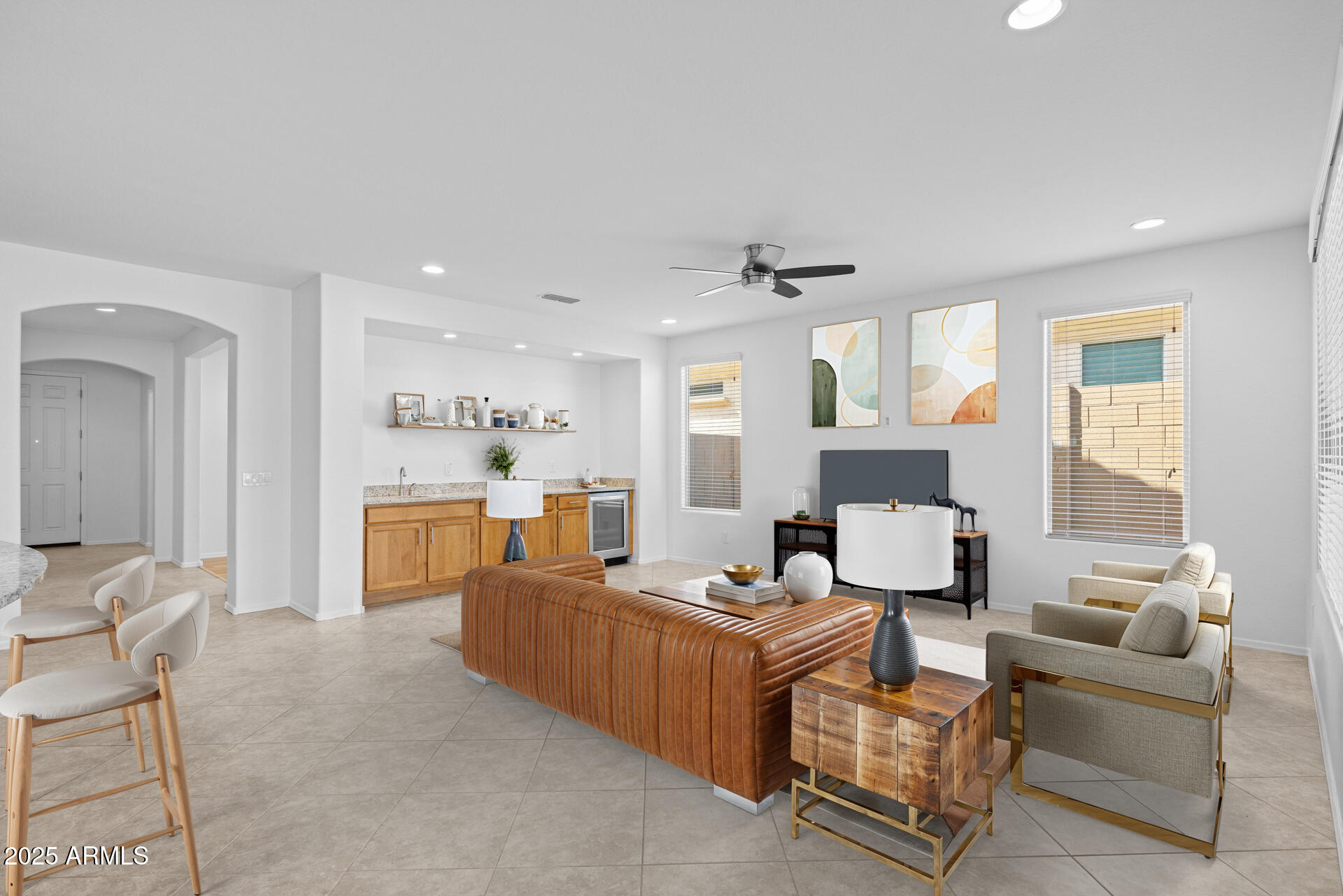 8160 West Cinder Brook Way Florence, AZ 85132 - Photo 11 of 81 a living room with furniture kitchen view and a window