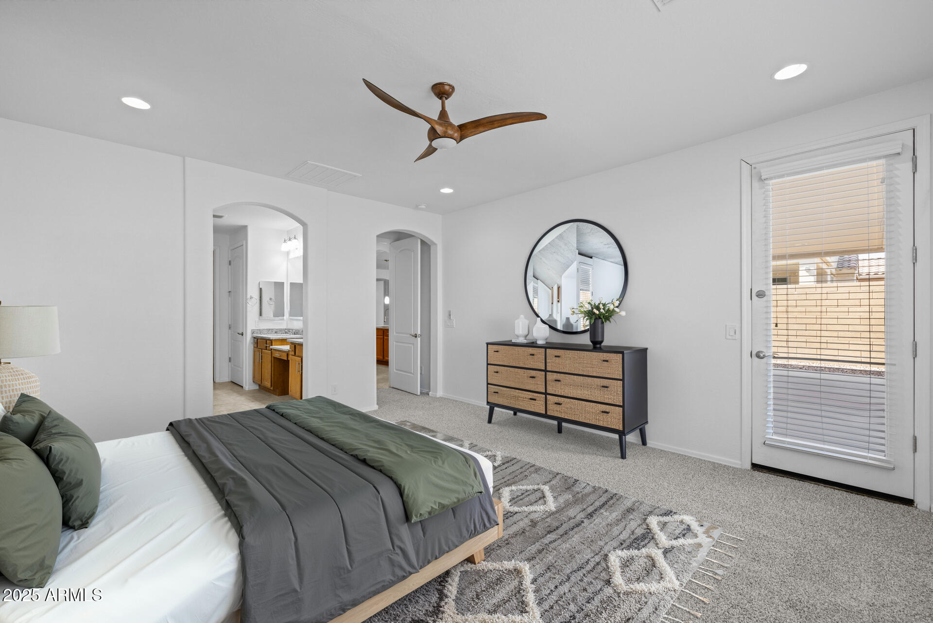 8160 West Cinder Brook Way Florence, AZ 85132 - Photo 18 of 81 a bedroom with a bed and a dresser