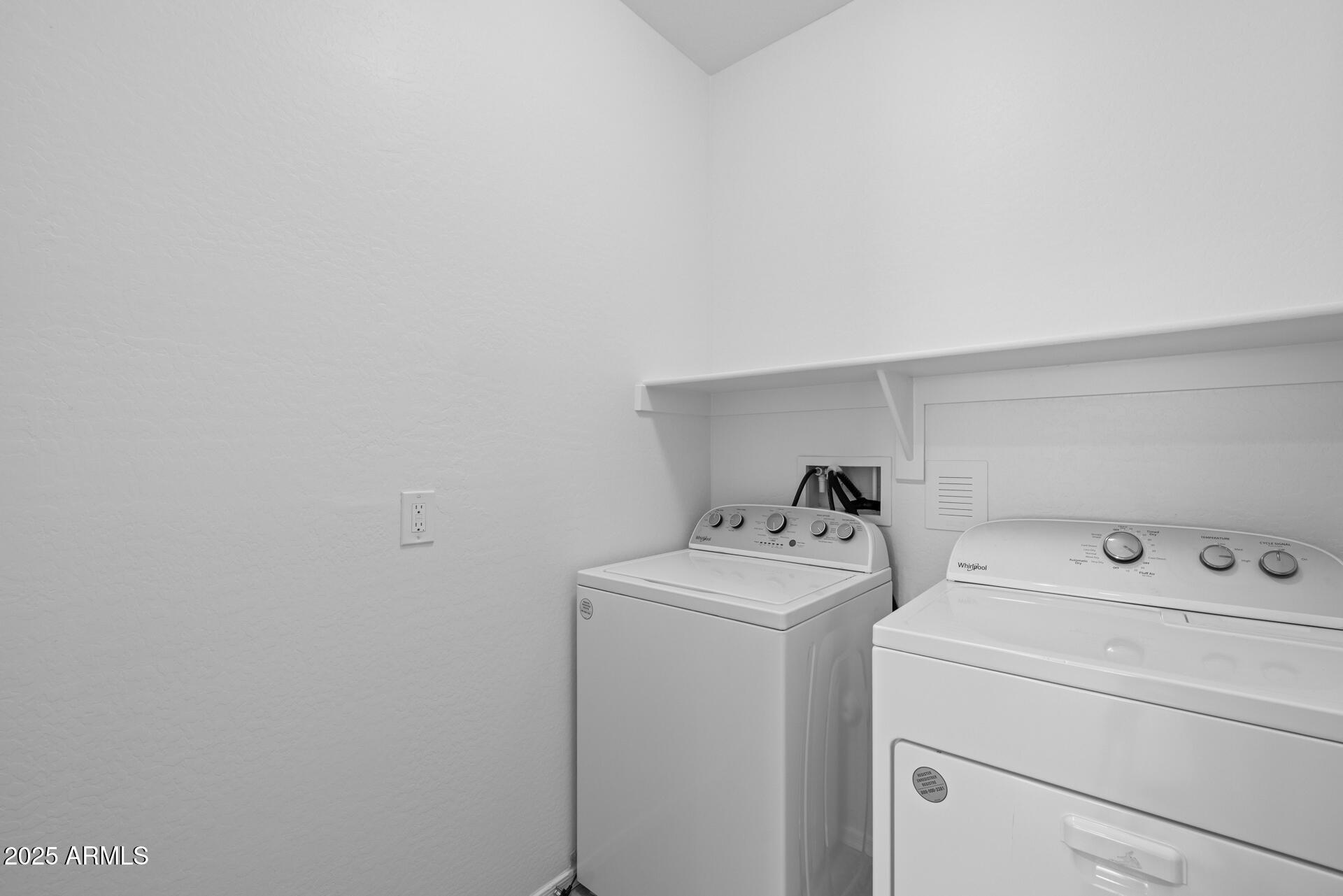 8160 West Cinder Brook Way Florence, AZ 85132 - Photo 26 of 81 a utility room with dryer and washer