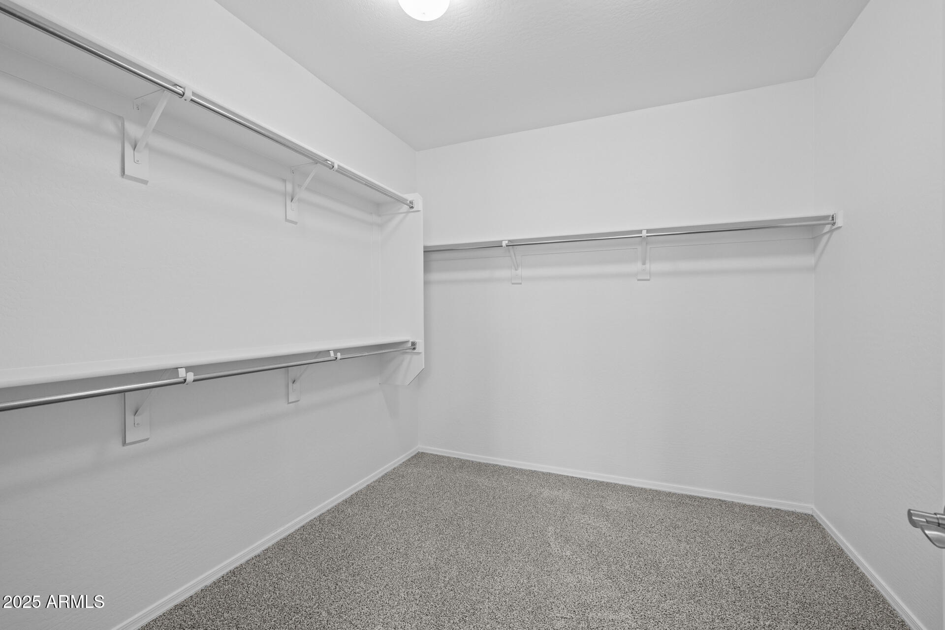 8160 West Cinder Brook Way Florence, AZ 85132 - Photo 28 of 81 a view of an empty walk in closet