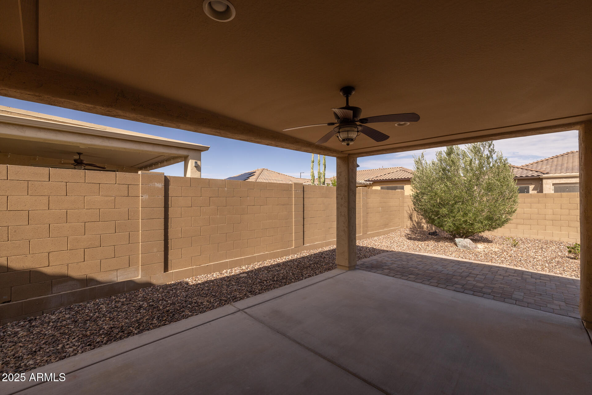 8160 West Cinder Brook Way Florence, AZ 85132 - Photo 32 of 81 a view of a room with a ceiling fan and window