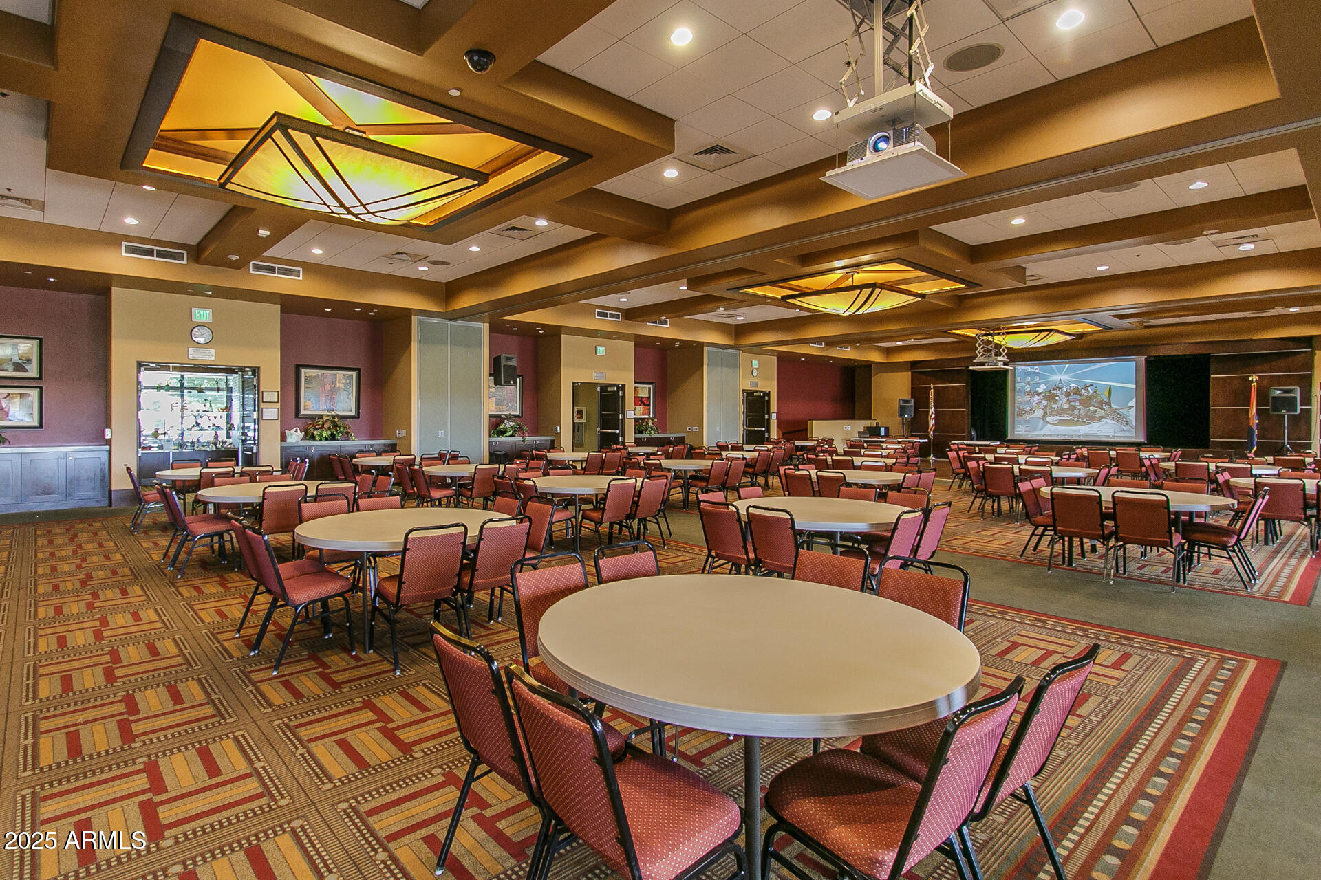 8160 West Cinder Brook Way Florence, AZ 85132 - Photo 53 of 81 a view of a dining room with lots of furniture and a chandelier
