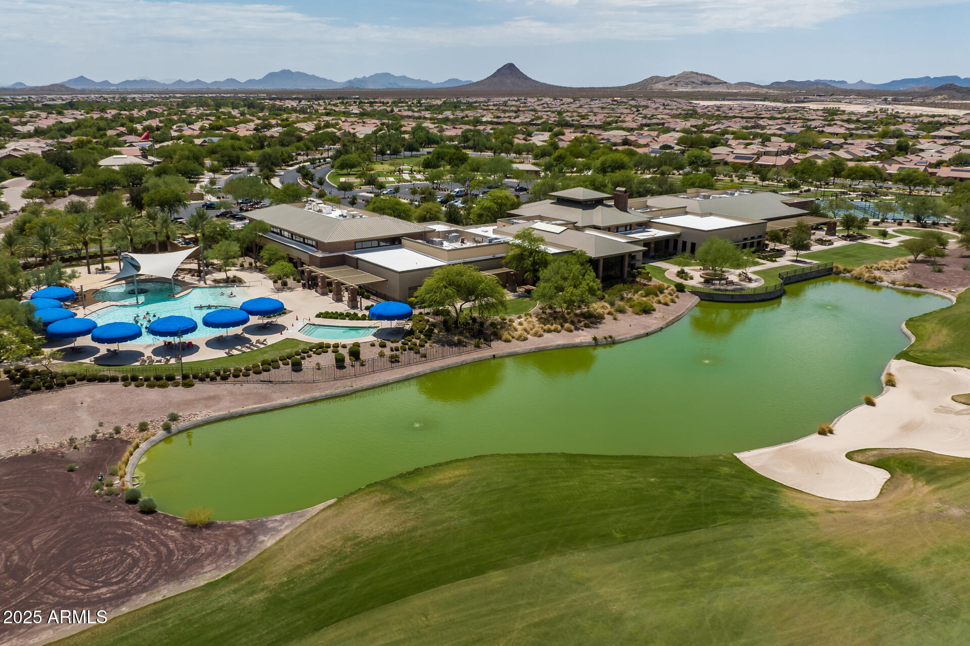 8160 West Cinder Brook Way Florence, AZ 85132 - Photo 60 of 81 an aerial view of residential houses with outdoor space and river