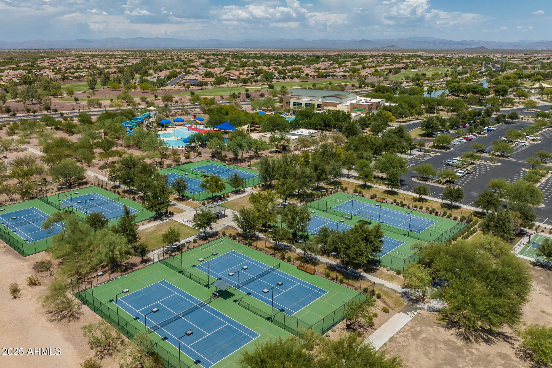 8160 West Cinder Brook Way Florence, AZ 85132 - Photo 72 of 81 an aerial view of a house with a yard