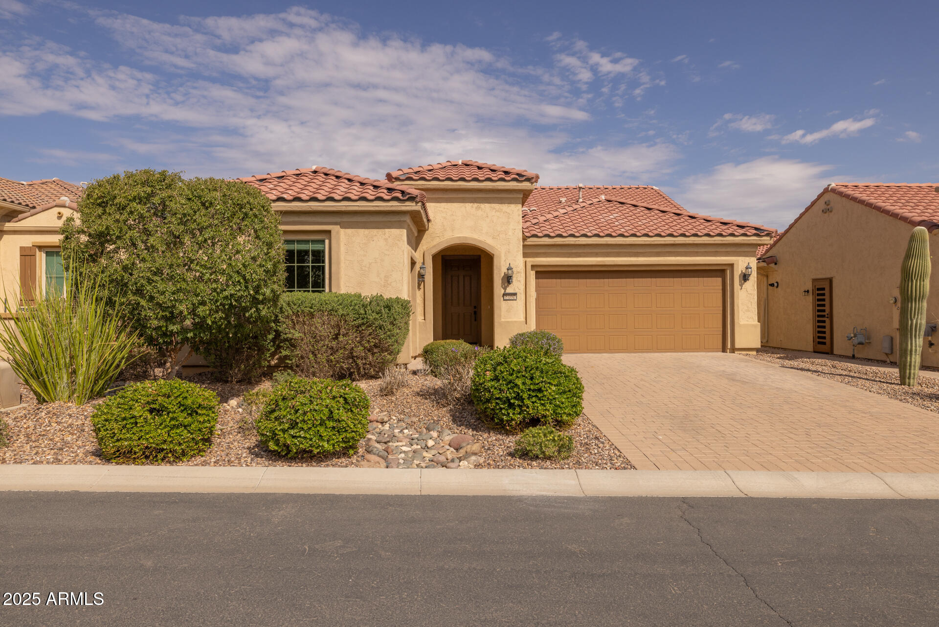 8160 West Cinder Brook Way Florence, AZ 85132 - Photo 79 of 81 front view of a house with a garden