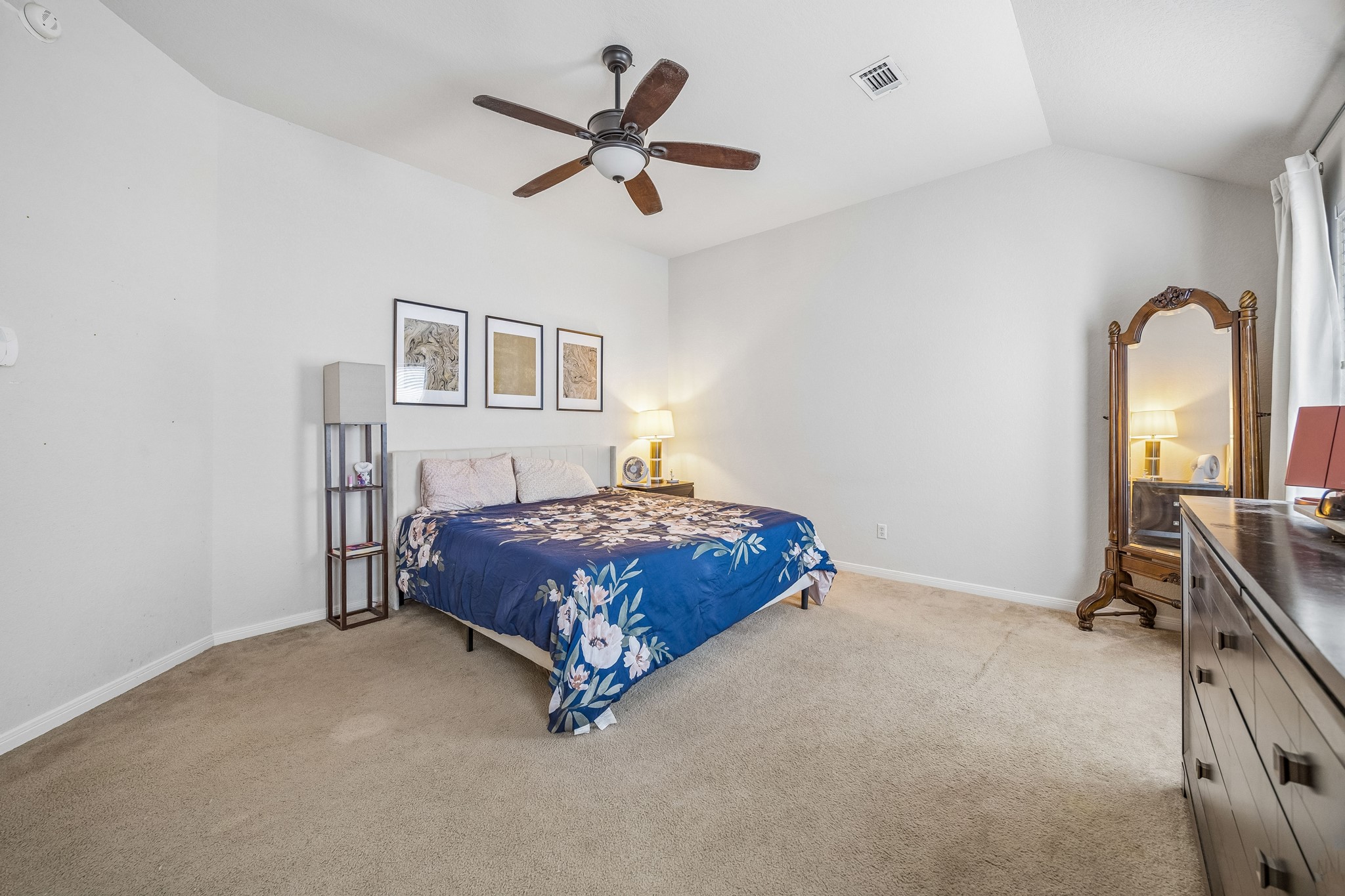 24027 Floragate Drive Spring, TX 77373 - Photo 15 of 21 a bedroom with a bed next to a window