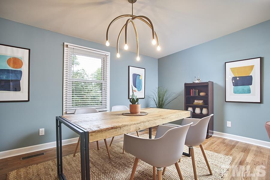 2203 Chapel Hill Road Durham, NC 27707 - Photo 12 of 37 a dining room with furniture and window