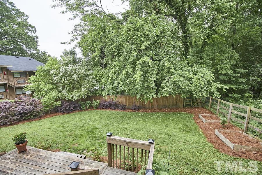 2203 Chapel Hill Road Durham, NC 27707 - Photo 34 of 37 a view of a backyard with a garden