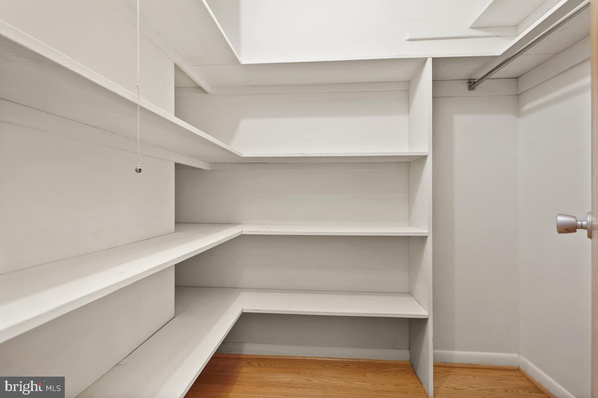 2606 Deerdell Lane Reston, VA 20191 - Photo 35 of 49 a view of an empty walk in closet