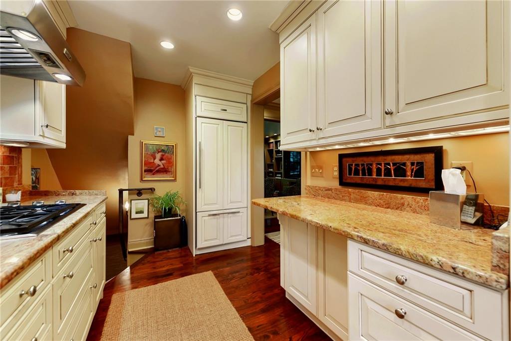 604 Pennridge Road Pittsburgh, PA 15211 - Photo 11 of 25 a kitchen with stainless steel appliances granite countertop a stove and a refrigerator