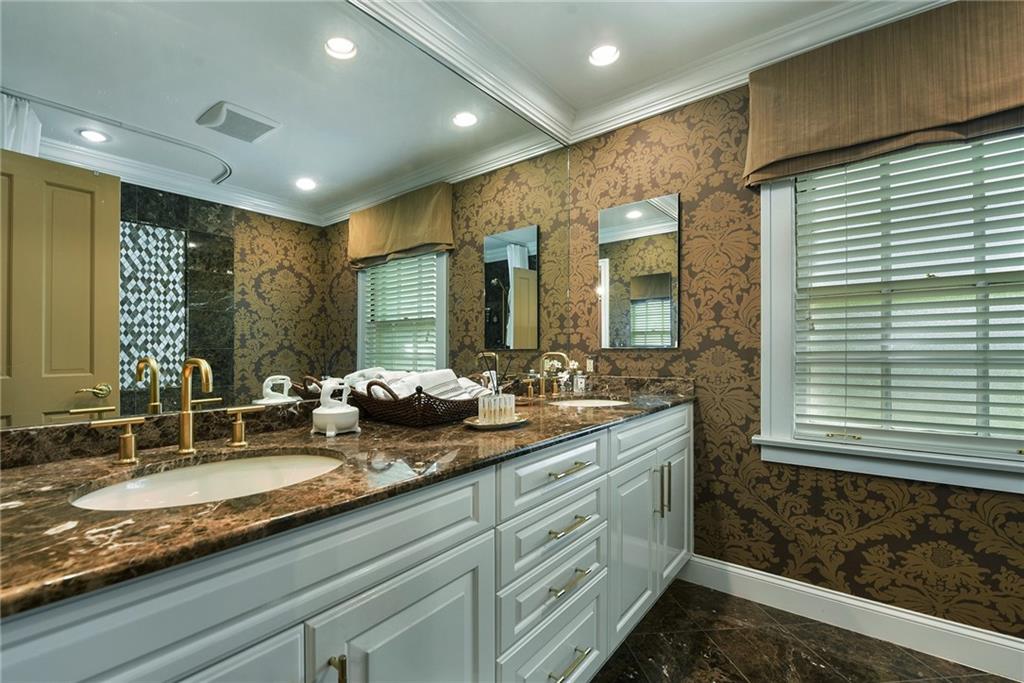 604 Pennridge Road Pittsburgh, PA 15211 - Photo 17 of 25 a bathroom with a double vanity sink and a mirror