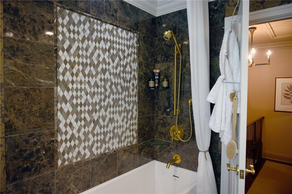 604 Pennridge Road Pittsburgh, PA 15211 - Photo 18 of 25 a bathroom with a bathtub and shower