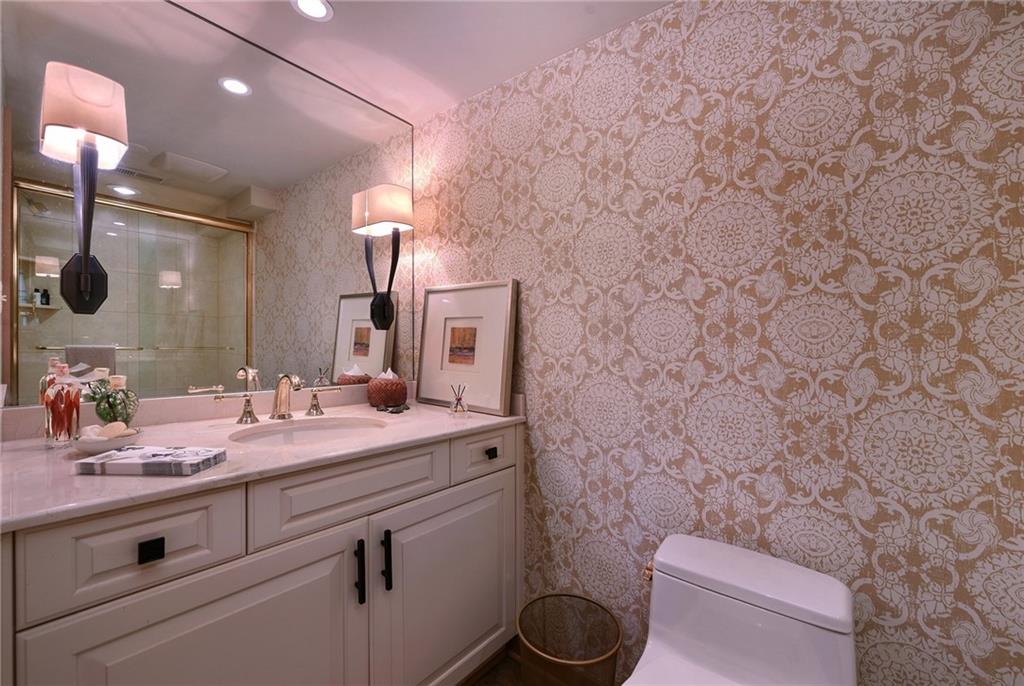 604 Pennridge Road Pittsburgh, PA 15211 - Photo 20 of 25 a bathroom with a granite countertop toilet sink and mirror