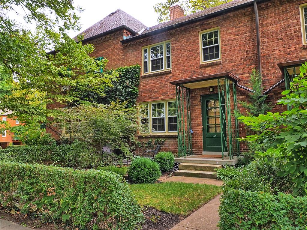 604 Pennridge Road Pittsburgh, PA 15211 - Photo 2 of 25 a view of brick house with a yard and plants