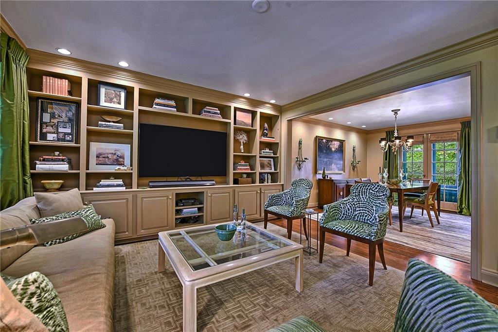 604 Pennridge Road Pittsburgh, PA 15211 - Photo 4 of 25 a living room with furniture and a flat screen tv