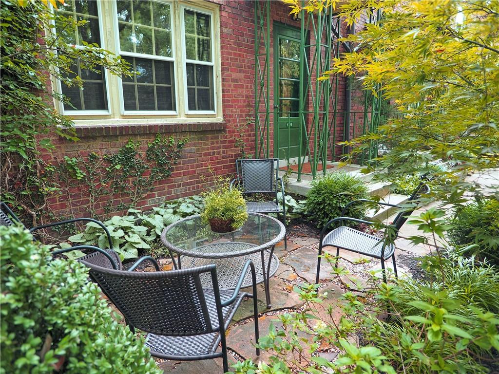 604 Pennridge Road Pittsburgh, PA 15211 - Photo 9 of 25 a view of a chair and table in backyard of the house