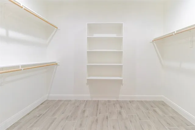 a view of hallway with livingroom