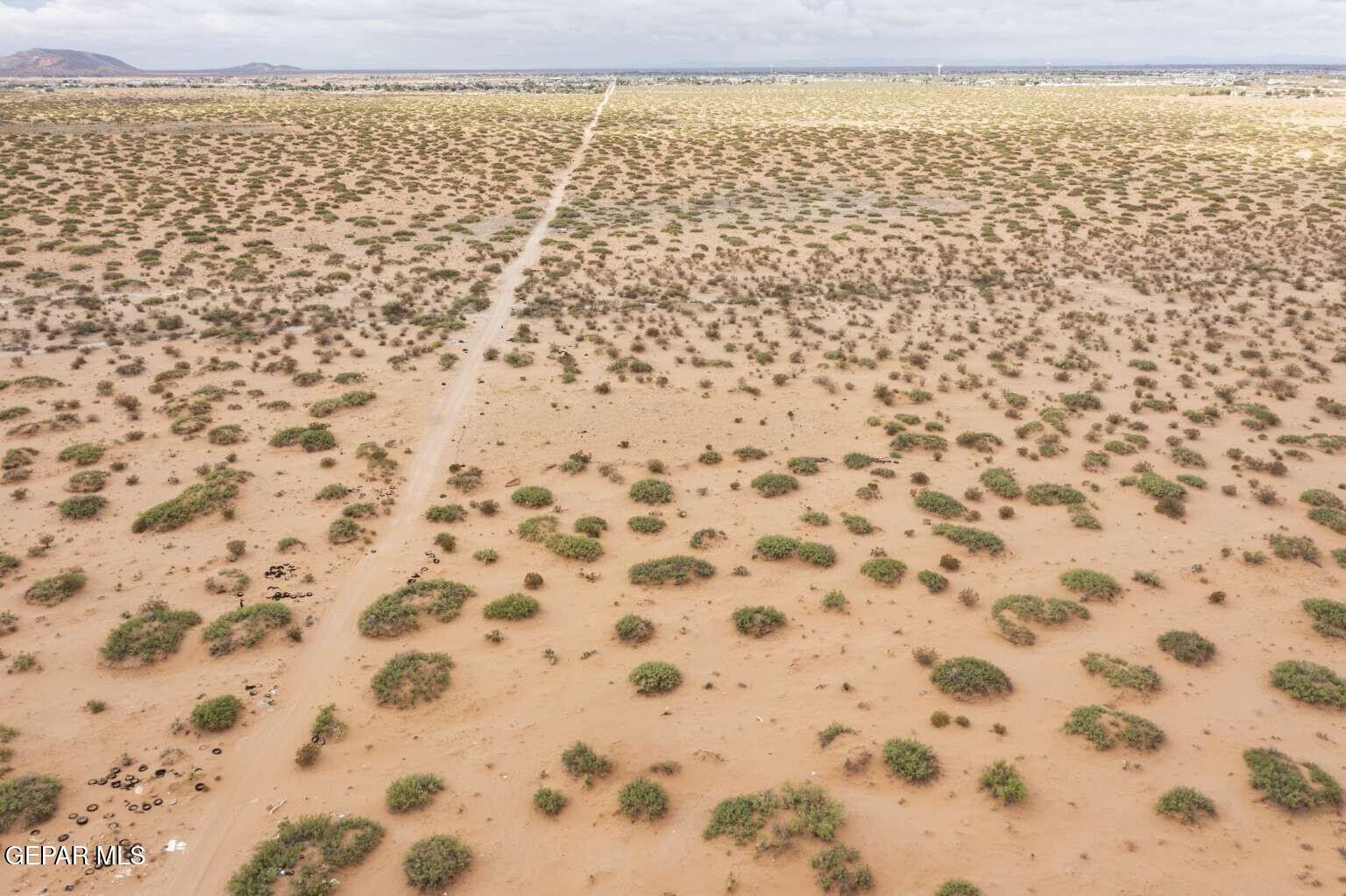Pn-402299 O'shea Road El Paso, TX 79938 - Photo 13 of 45 a bathroom with a shower curtain