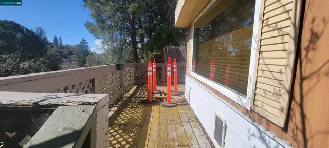 a view of balcony and wooden floor