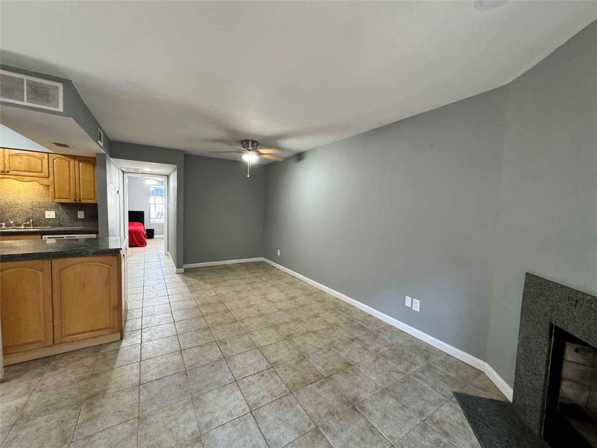 6001 Reims Road, Unit 309 Houston, TX 77036 - Photo 13 of 23 a view of a refrigerator in a kitchen