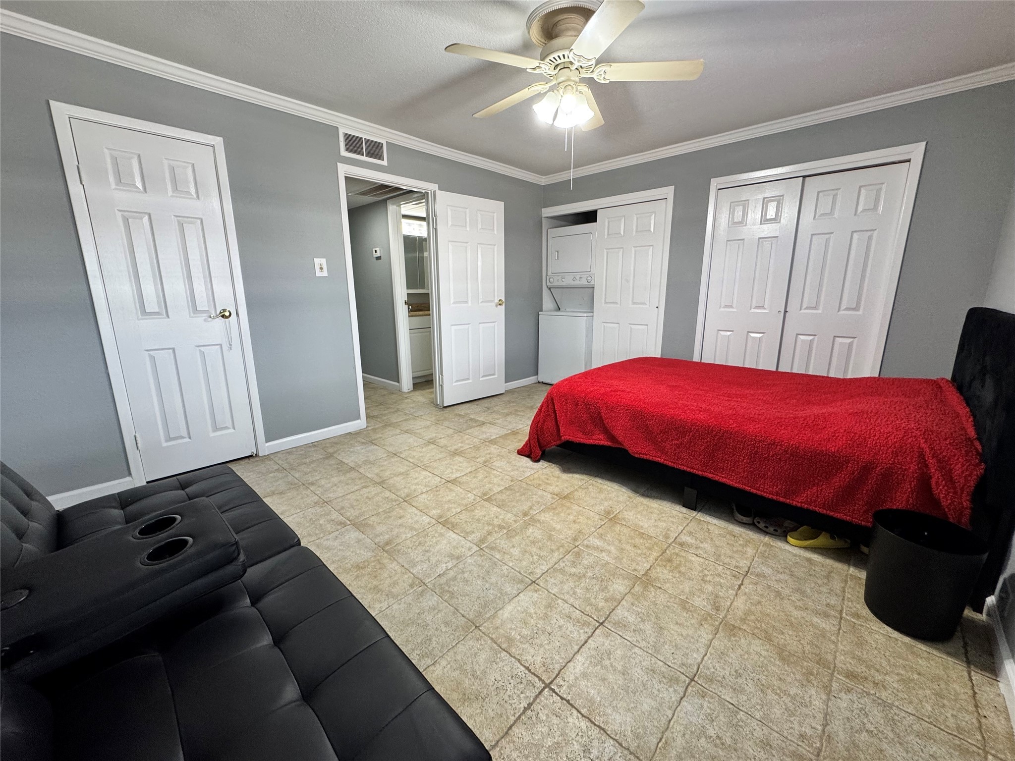 6001 Reims Road, Unit 309 Houston, TX 77036 - Photo 16 of 23 a bedroom with a bed and a window