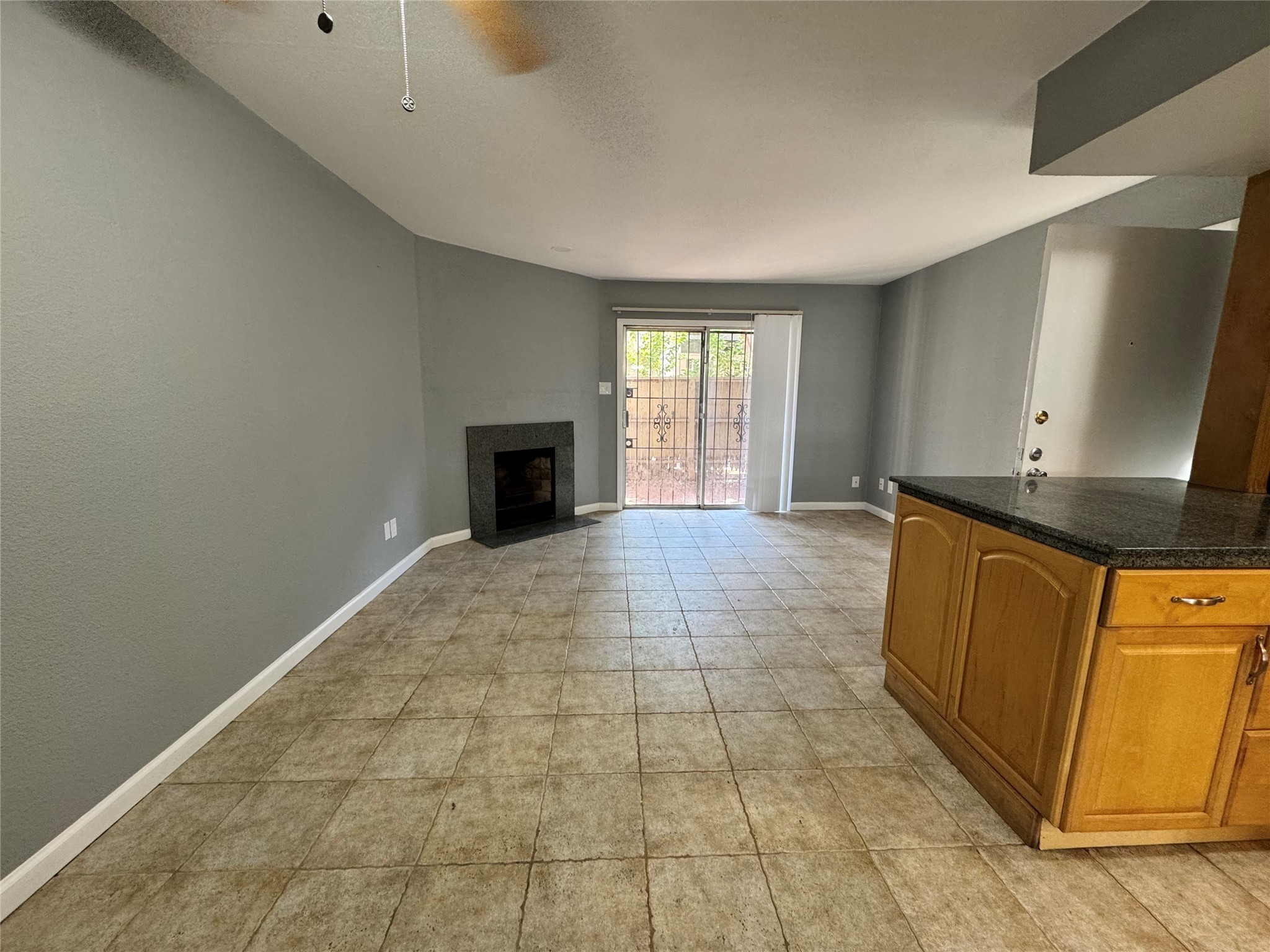 6001 Reims Road, Unit 309 Houston, TX 77036 - Photo 6 of 23 a view of a kitchen with a sink and a window