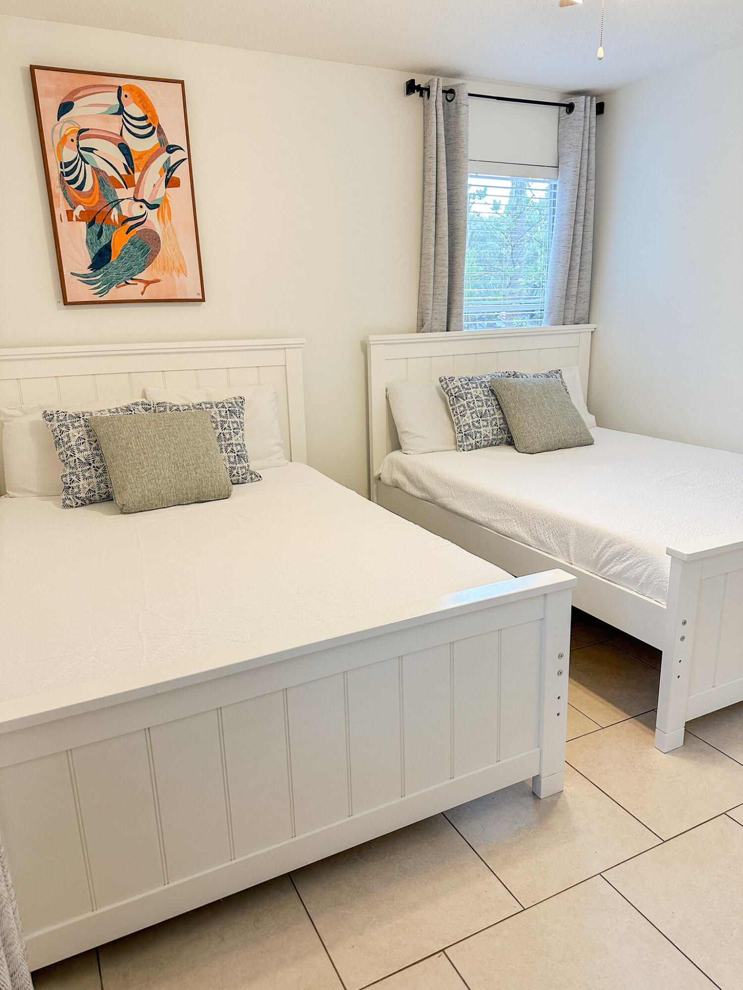 9815 Highway 98, Unit 144 Miramar Beach, FL 32550 - Photo 26 of 70 a bedroom with a bed and a painting on the wall