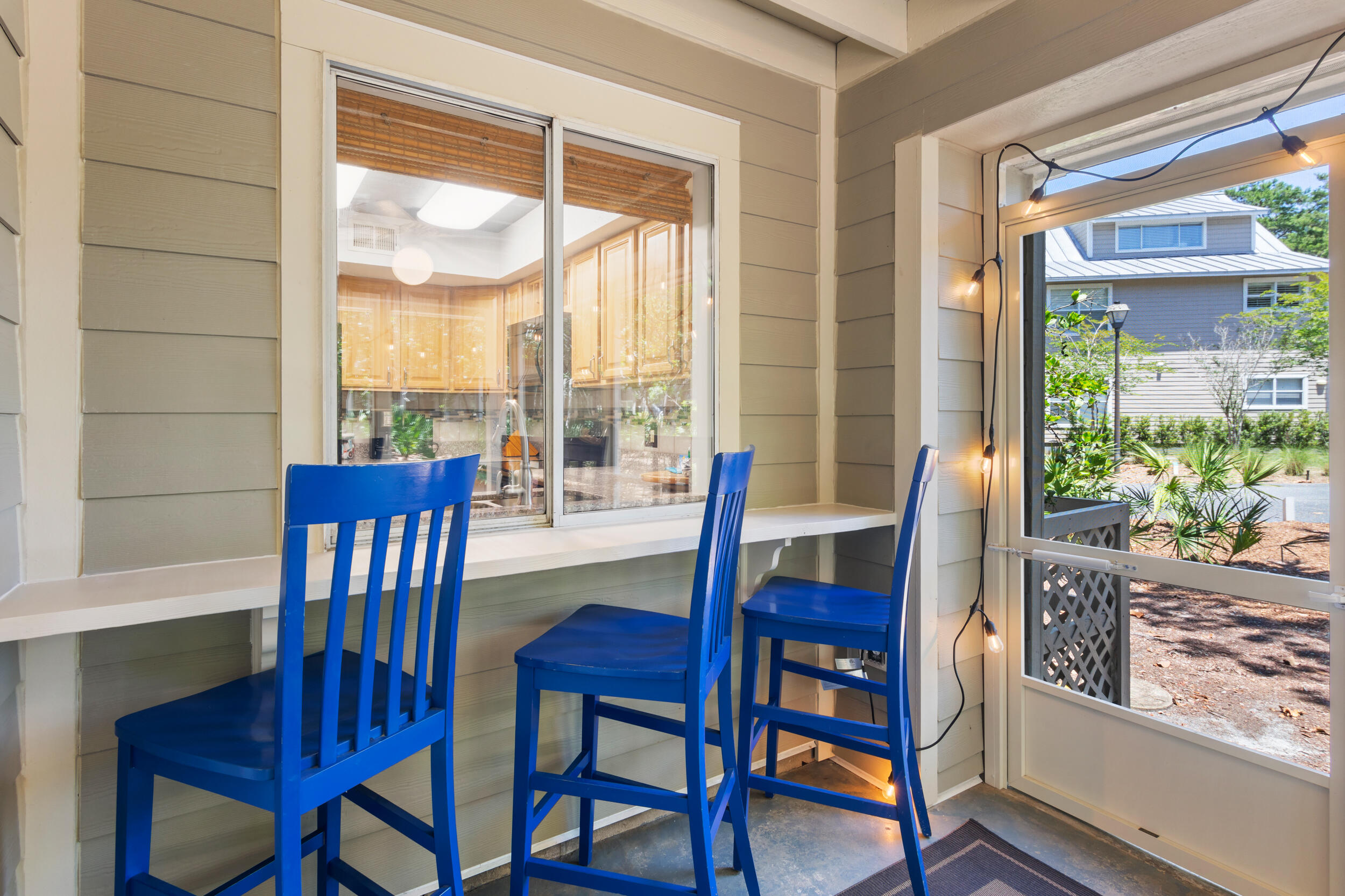 9815 Highway 98, Unit 144 Miramar Beach, FL 32550 - Photo 32 of 70 a view of a dining room with furniture window and wooden floor