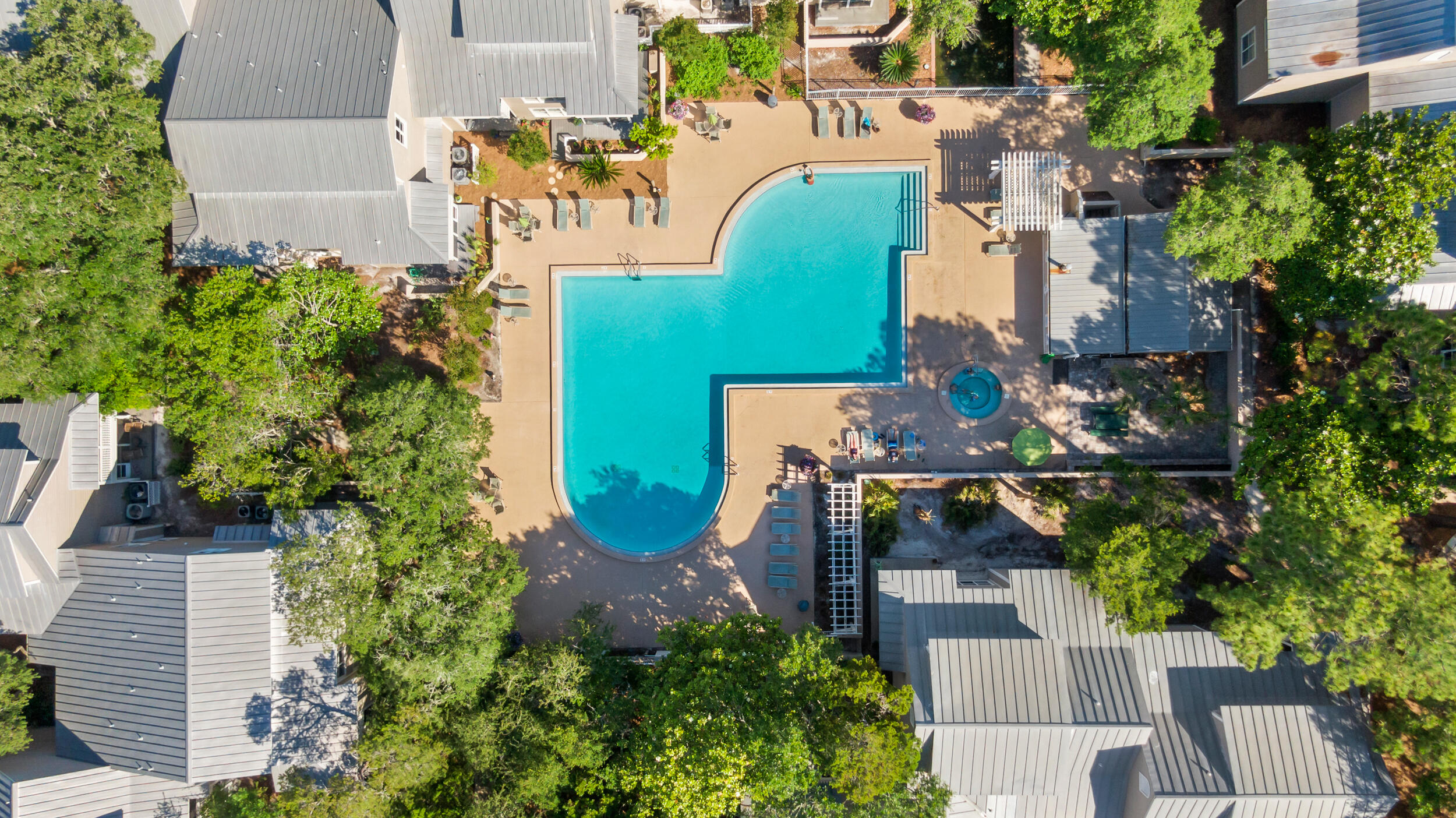 9815 Highway 98, Unit 144 Miramar Beach, FL 32550 - Photo 34 of 70 an aerial view of a house with outdoor space pool patio and outdoor seating
