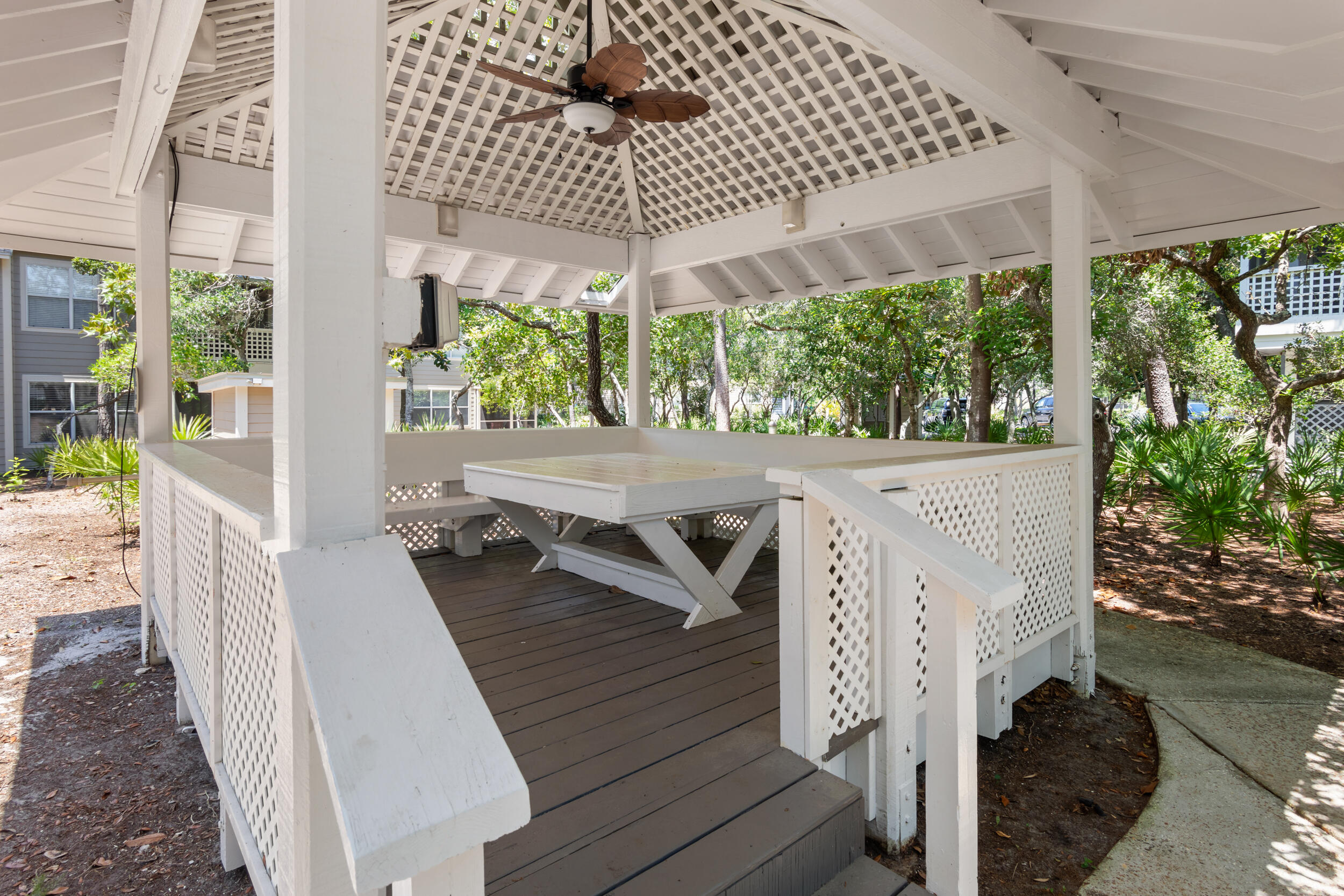 9815 Highway 98, Unit 144 Miramar Beach, FL 32550 - Photo 44 of 70 a view of a patio with wooden floor
