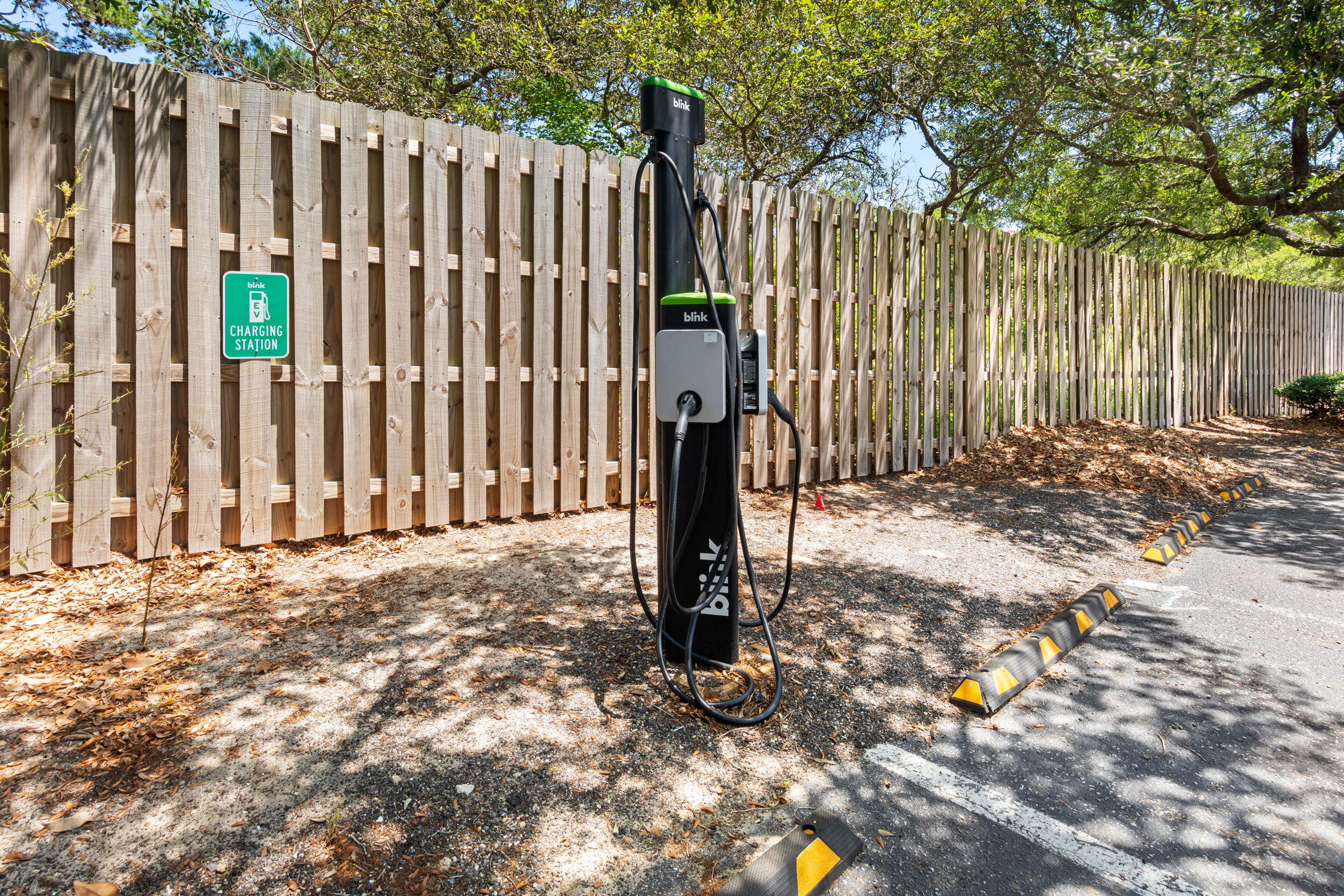 9815 Highway 98, Unit 144 Miramar Beach, FL 32550 - Photo 54 of 70 a view of a backyard with wooden fence