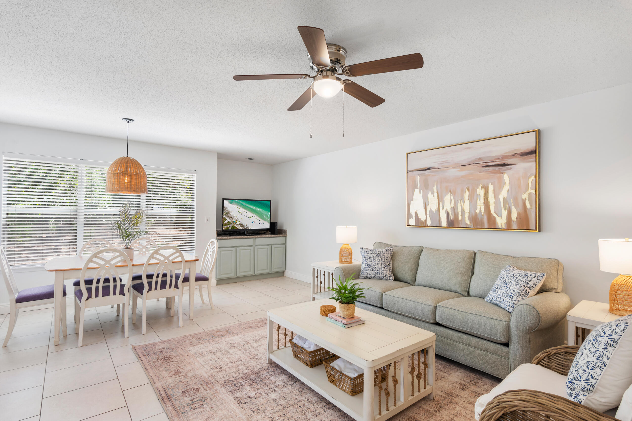 9815 Highway 98, Unit 144 Miramar Beach, FL 32550 - Photo 9 of 70 a living room with furniture and a flat screen tv