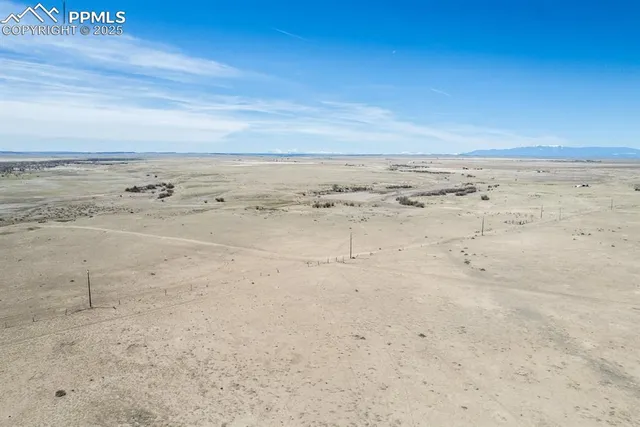a view of beach and an ocean